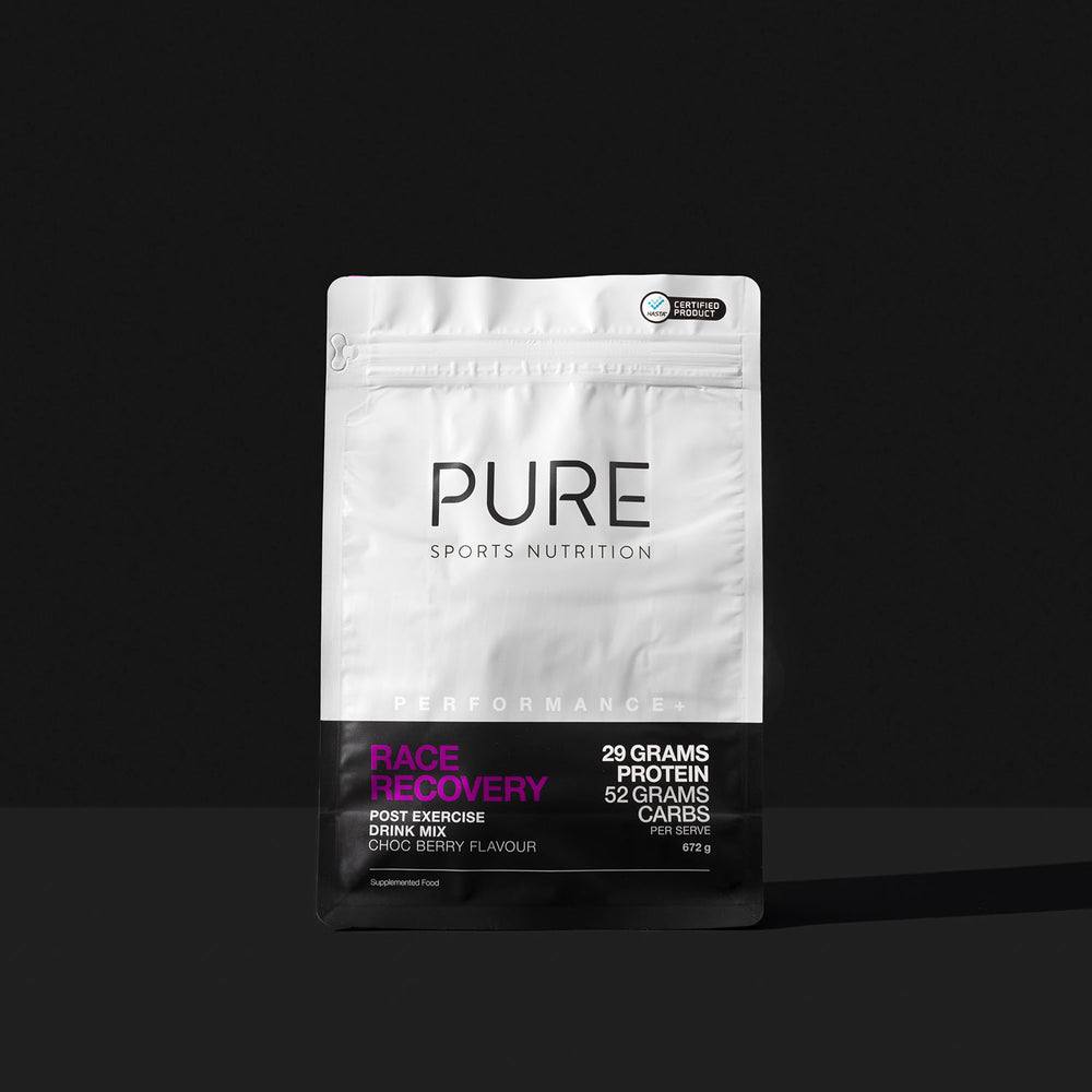 PURE Sports Nutrition Race Recovery for runners and cyclists.  Front on image of packaging.